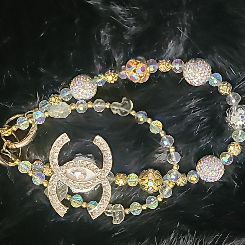 Gold tone Bag Charm, Ab Stone And Gold Beads.
